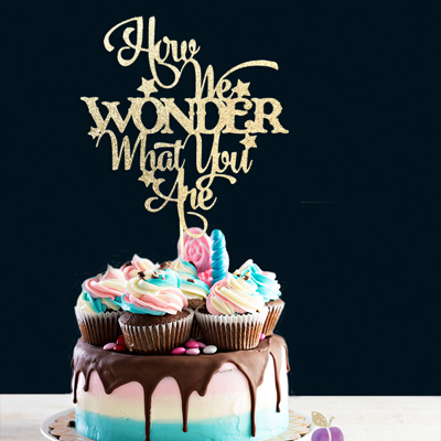 How we wonder what you are cake topper