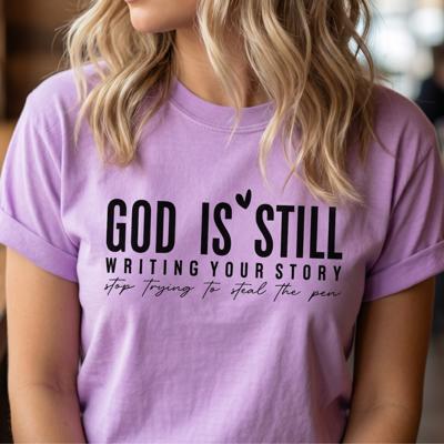 God Is Still Writing Your Story Graphic Tee, Christian Shirt for Women, Faith Based Tee, Inspirational Religious Gift for Her, Comfort Colors Bible Verse Tee