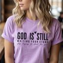  God Is Still Writing Your Story Graphic Tee, Christian Shirt for Women, Faith Based Tee, Inspirational Religious Gift for Her, Comfort Colors Bible Verse Tee