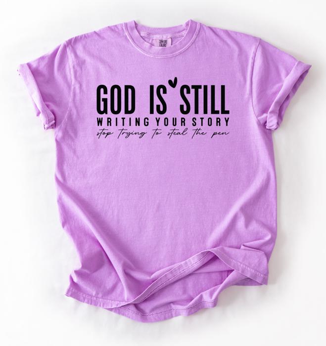 God Is Still Writing Your Story Graphic Tee, Christian Shirt for Women, Faith Based Tee, Inspirational Religious Gift for Her, Comfort Colors Bible Verse Tee