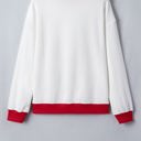  Raylee Trim Merry Slogan Pullover