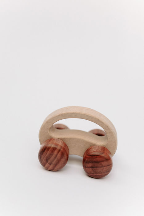Wooden toy on wheels
